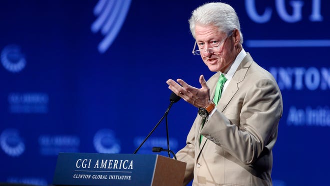 Former President Bill Clinton speaks at an annual gathering of the Clinton Global Initiative America in Denver.